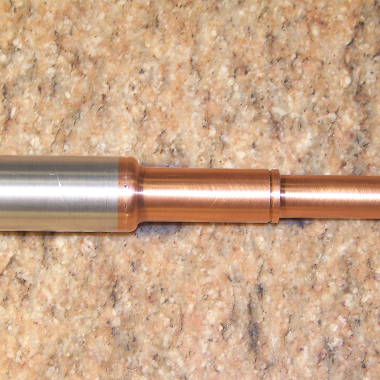 Inertia Friction Welding allows dissimilar metals to be joined, which reduces raw material cost.