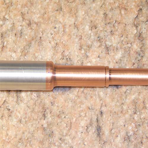 Inertia Friction Welding allows dissimilar metals to be joined, which reduces raw material cost.